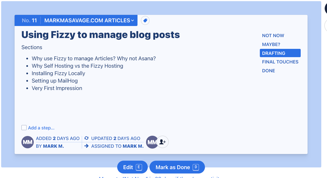 A blue card outlining the details of a task needing completed. The card was produced by the Fizzy Kanban application created by 37signals.